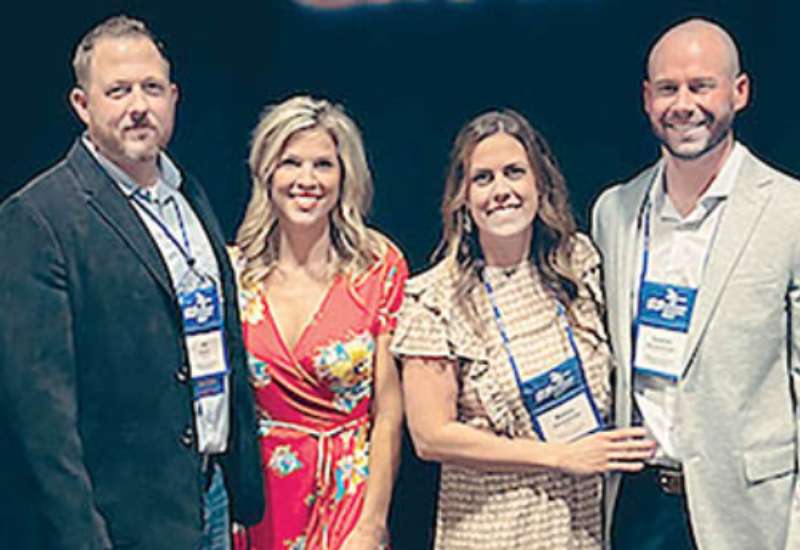 Applied Connective Technologies's Ed Knott & Justin Niewohner accept top award for growth